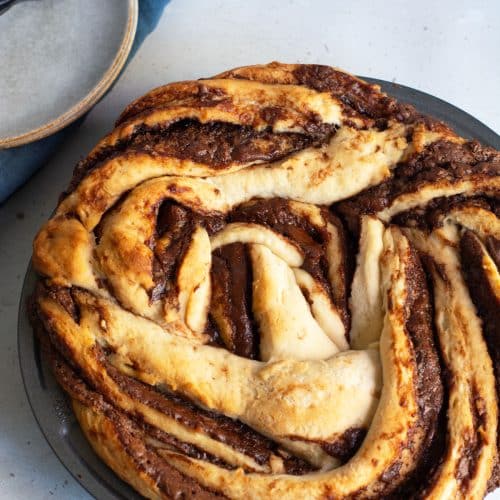 A baked gluten free breakfast twist on a table.
