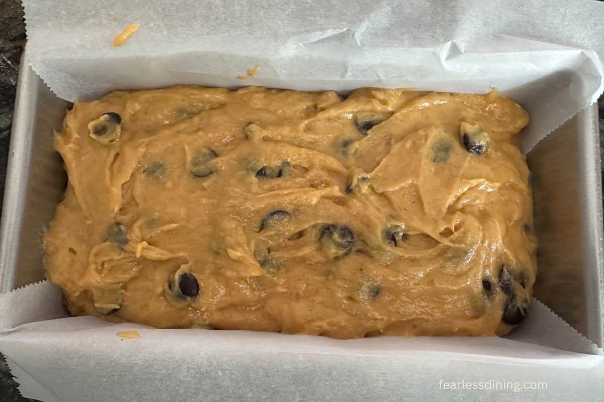 The gluten-free pumpkin banana bread batter in the loaf pan.