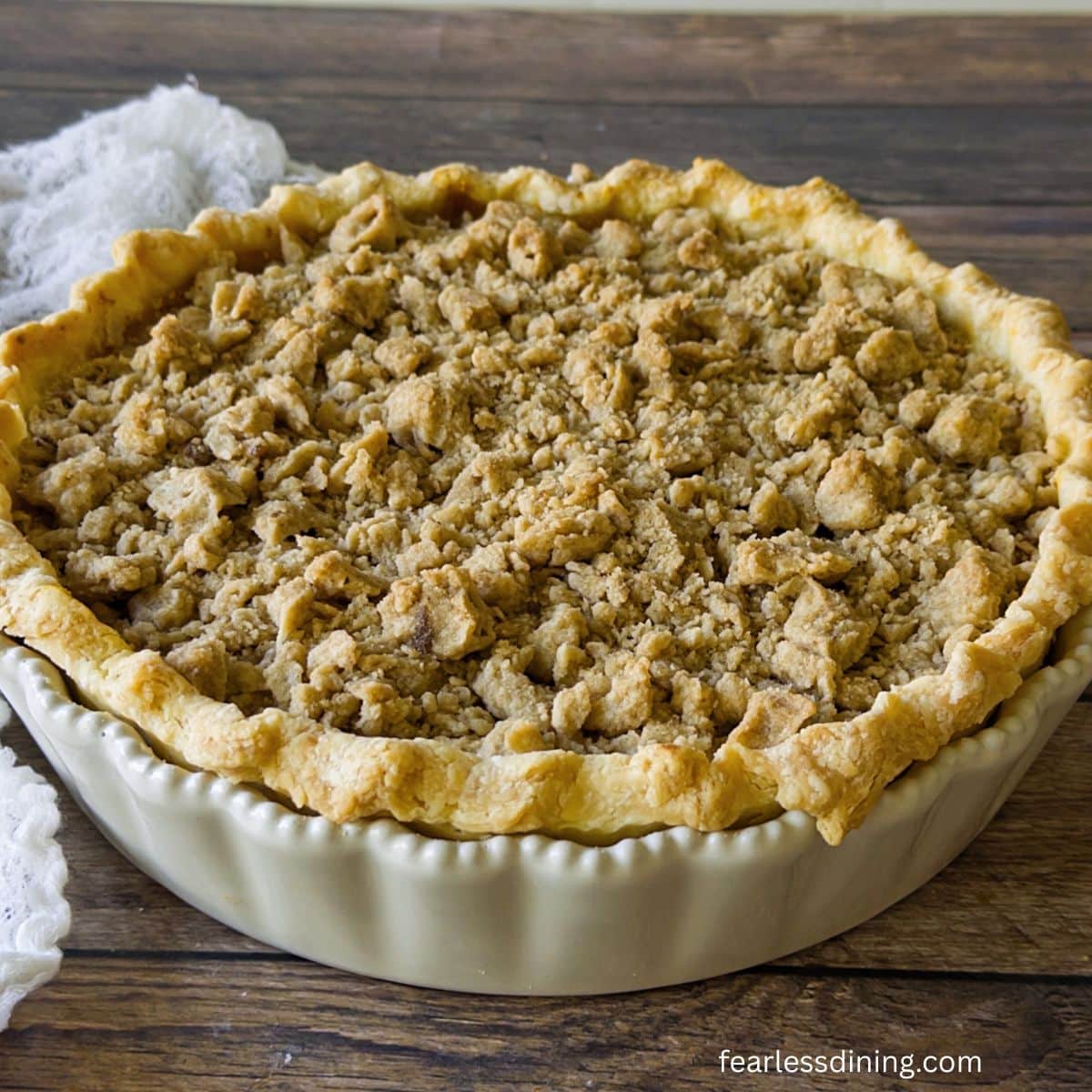 The fully baked gluten-free pumpkin pie with the crumb topping.