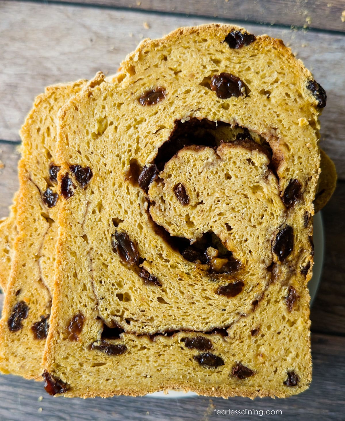 The pumpkin raisin sandwich bread sliced open so you can see the swirls.