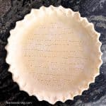A gluten-free sourdough pie crust ready to bake.
