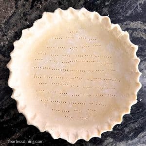 A gluten-free sourdough pie crust ready to bake.