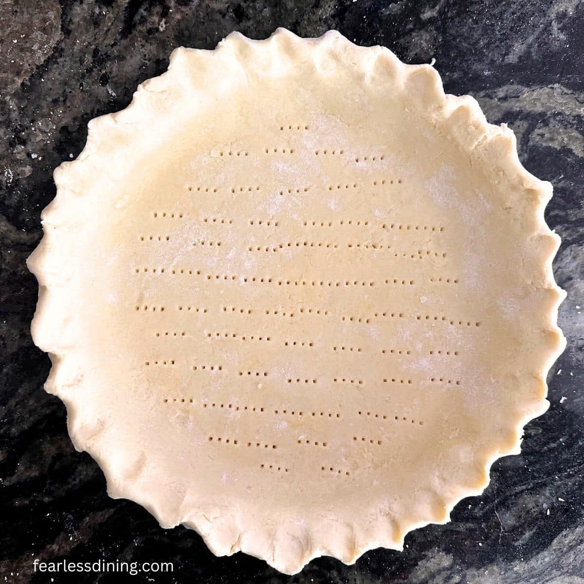 A gluten-free sourdough pie crust ready to bake.