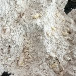 A close up of the gluten-free dry ingredients with the tiny butter crumbs.