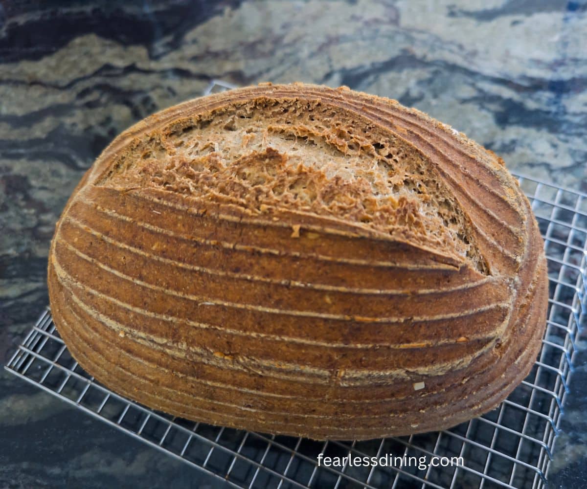 The baked loaf on a cooling rack.
