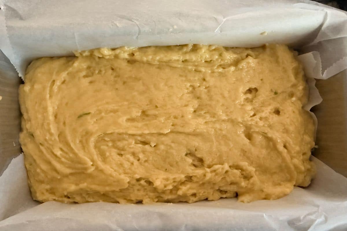 The olive oil cake batter in the loaf pan.