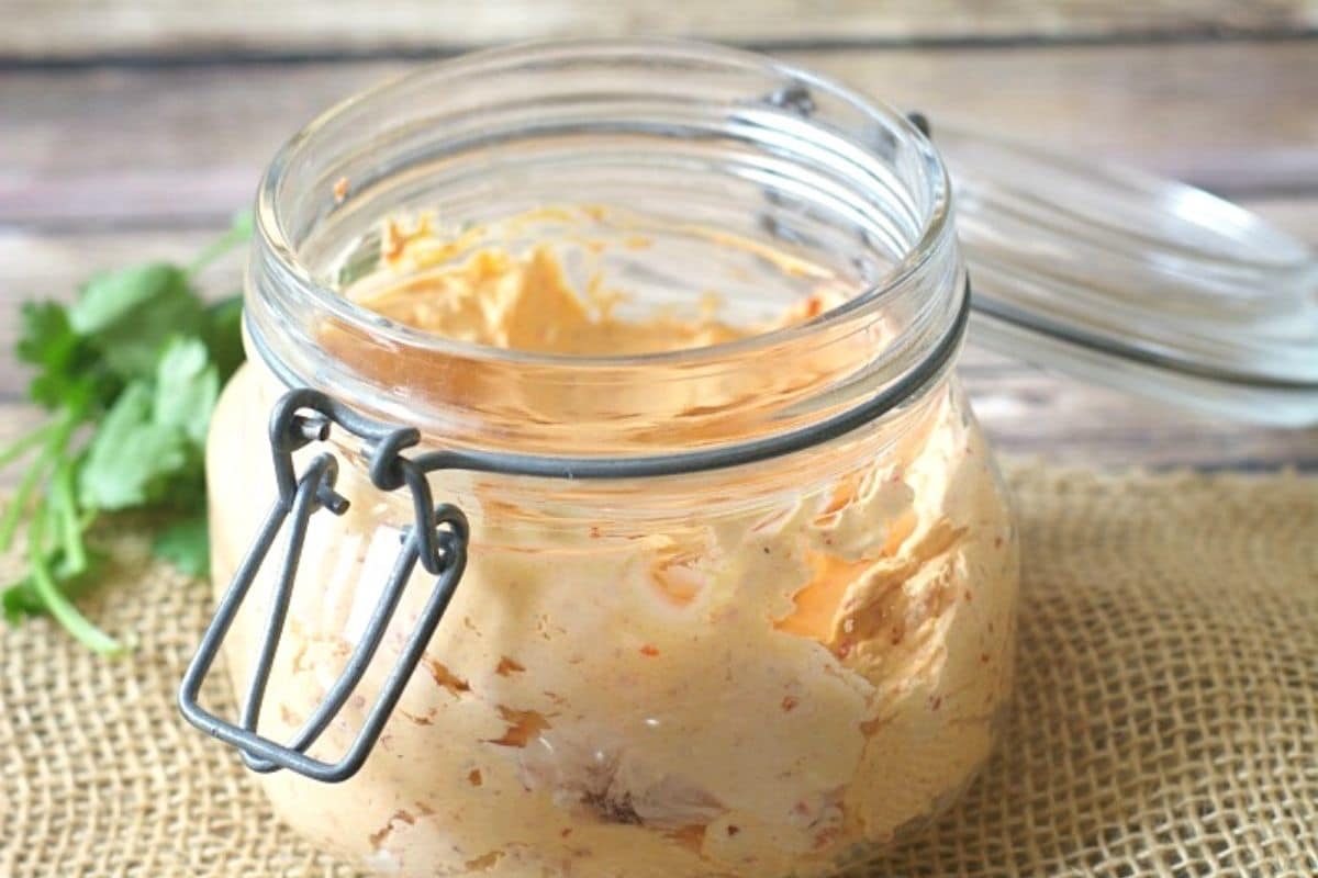 A jar of roasted red pepper cream cheese schmear.