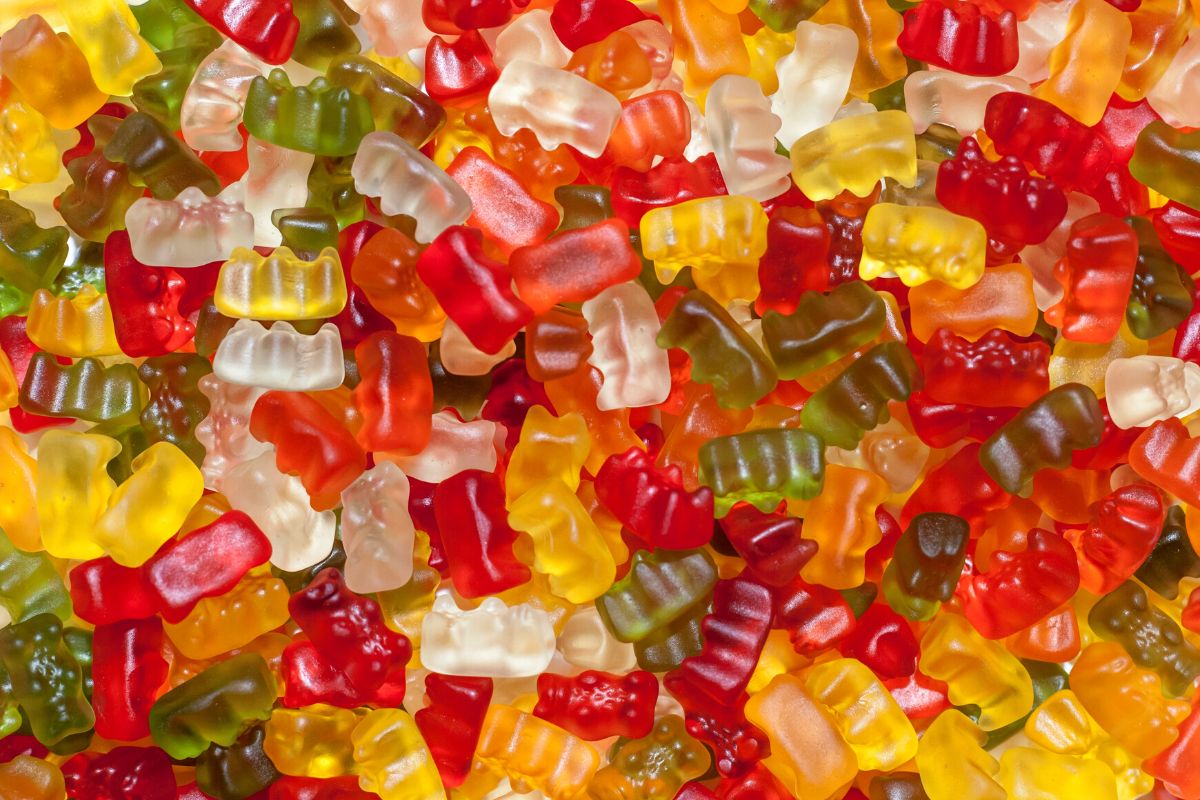 A close up of a lot of gummy bears.