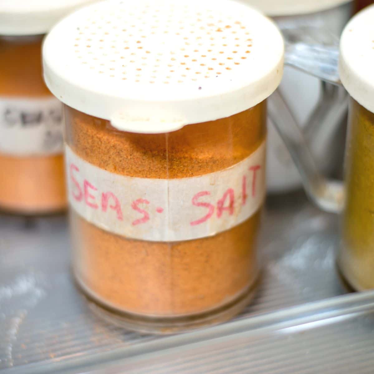 a small jar of homemade seasoned salt.
