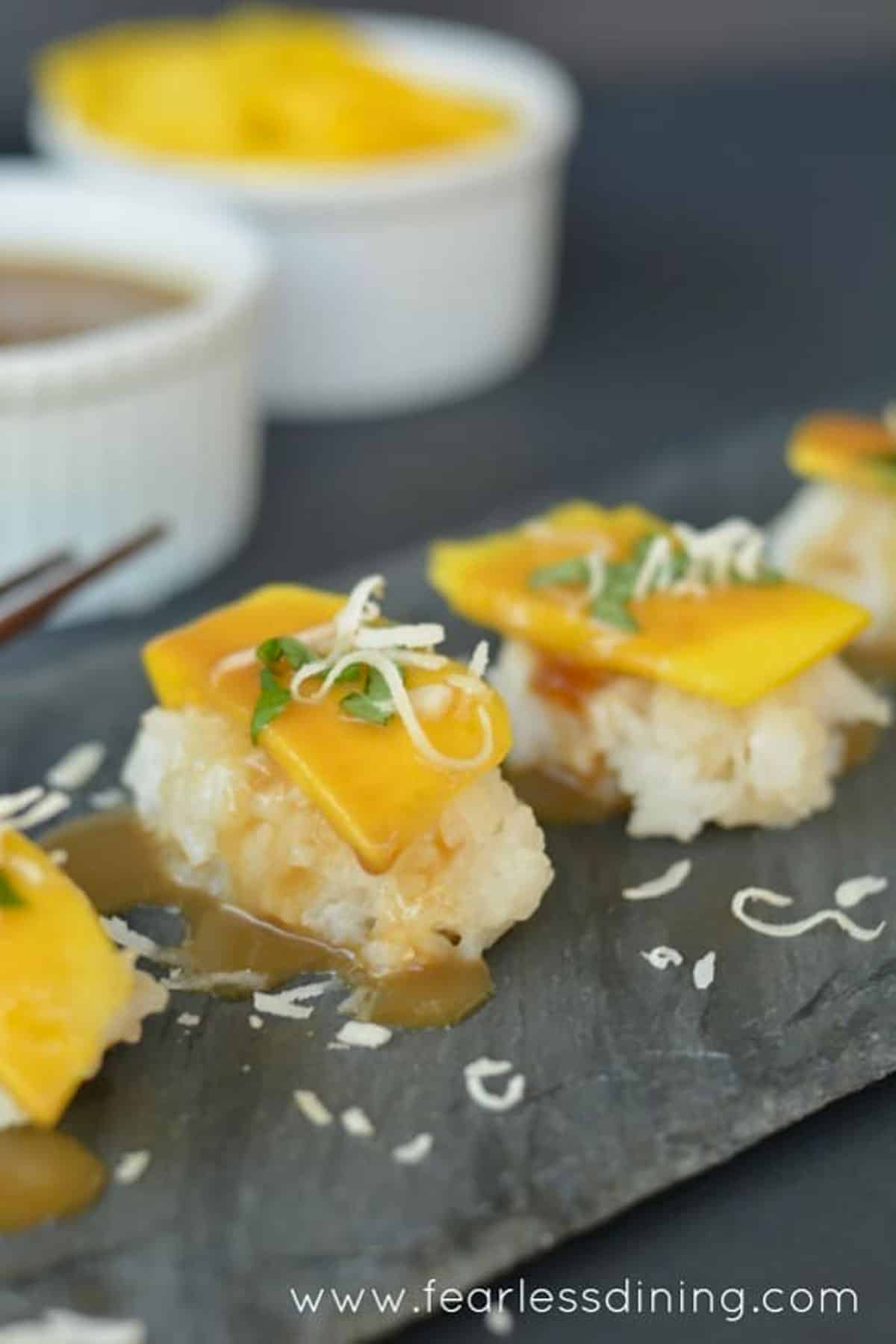 a photo of the mango sushi made with coconut milk.